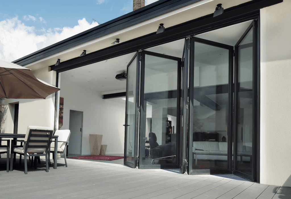 Screenshot 2022-04-13 at 15.16.56 | GFD Homes Black patio bifold door half open.