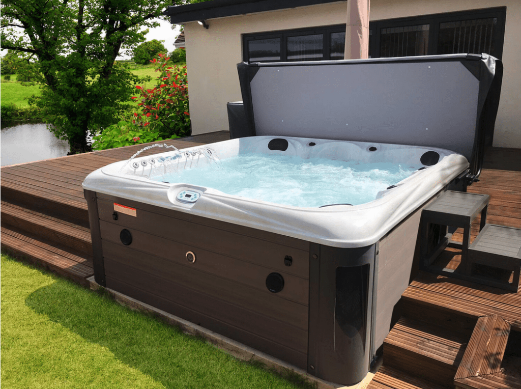 Screenshot-2022-04-27-at-12.28.36 | GFD Homes square hot tub: Hot tub installed in a back garden with decking.
