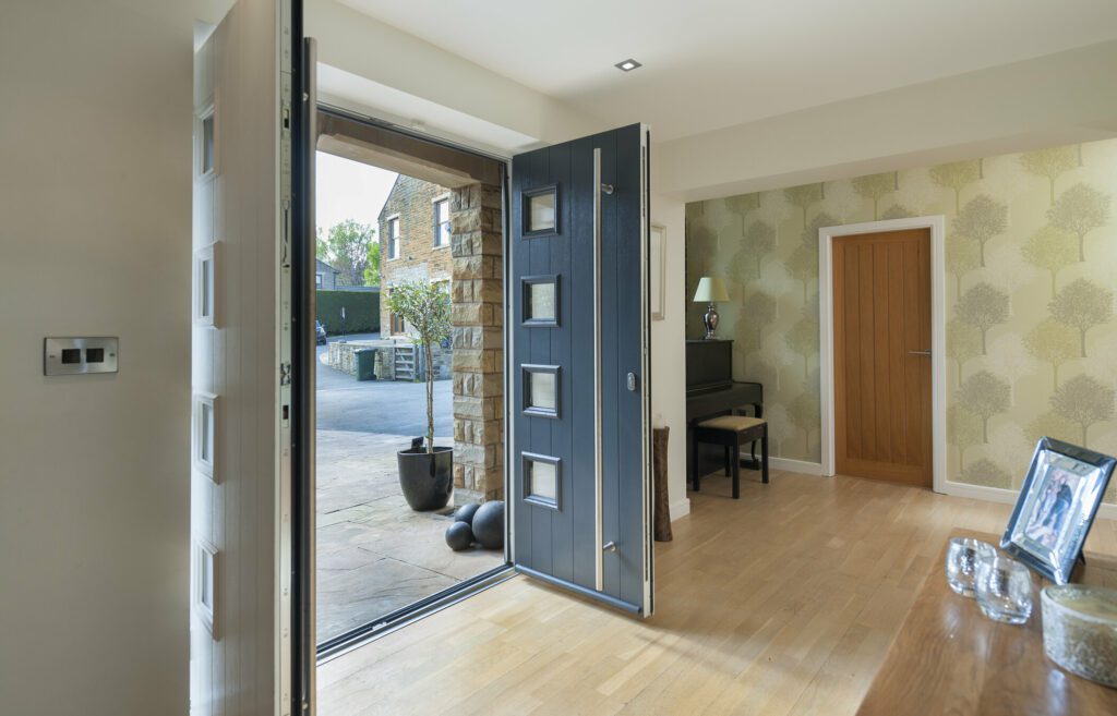 rsz__dsc0428 | GFD Homes front door: Composite french doors opened up to show the entrance area.