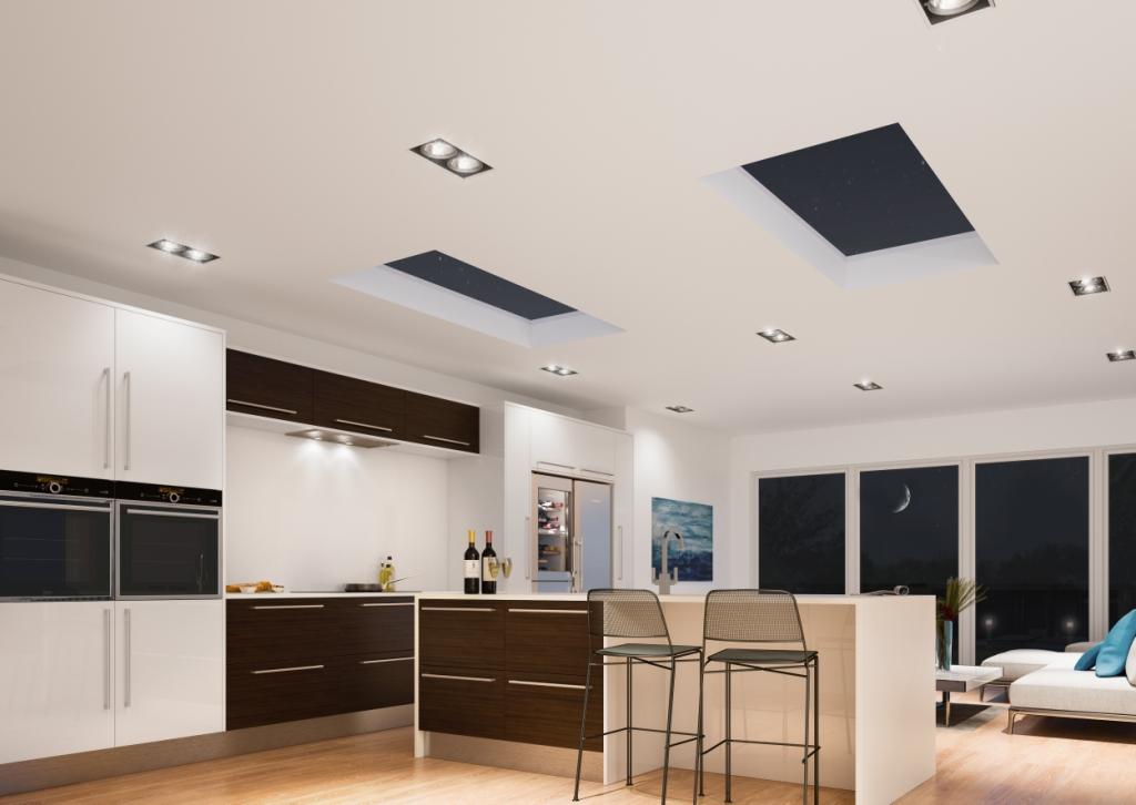 Andy8 | GFD Homes glass roof: Atlas roof lights installed above kitchen, inside view during the night.