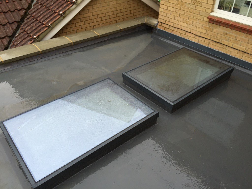 Barong-Windows-Flat-Rooflight-2 | GFD Homes glass roof: 2 roof lights installed on the roof of a building, top view.