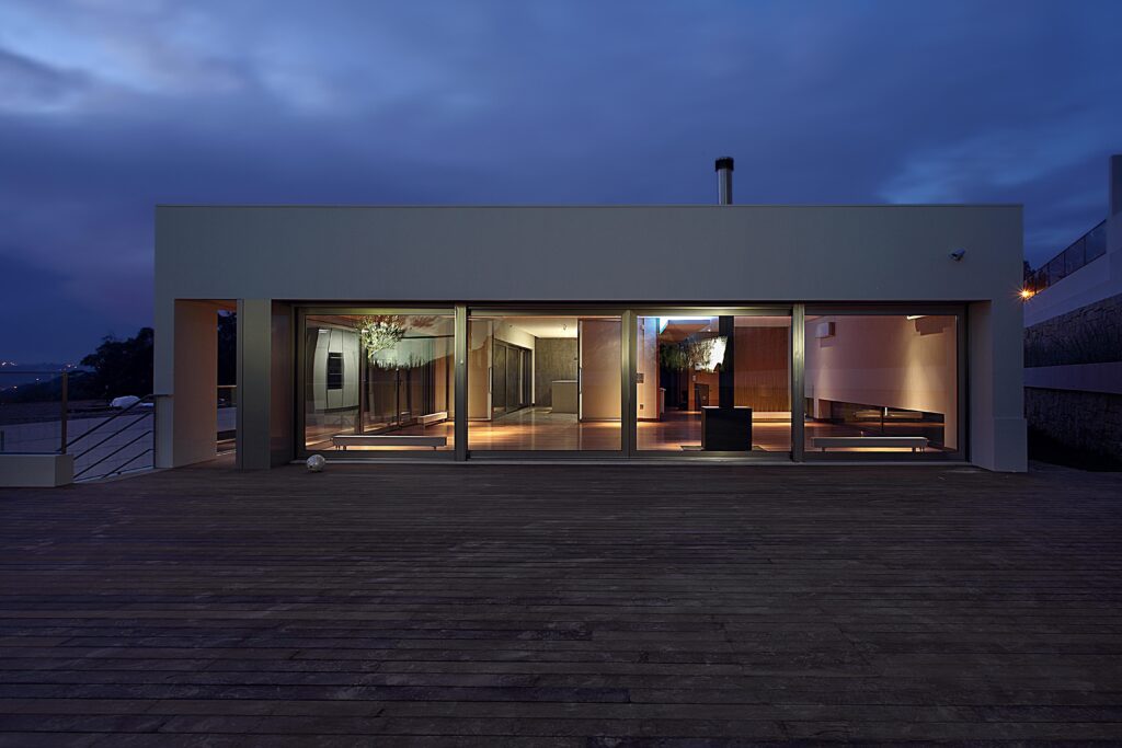 foto_3 | GFD Homes sliding patio doors: beach property with sliding doors installed, night time view.