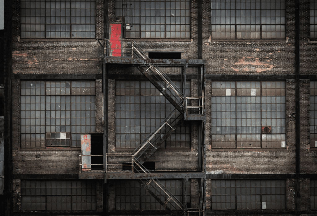 Screenshot-2022-07-27-at-16.39.56 | GFD Homes Industrial style windows: original crittall windows installed on a building and rusty.