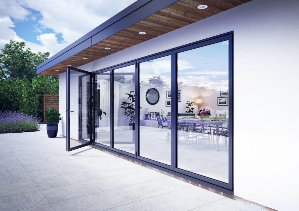 rsz_korniche_image_4 | GFD Homes folding door: Side view of home with a bifold door installed and the traffic door open.