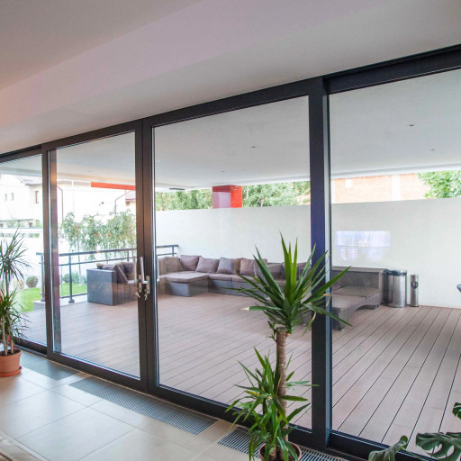 image-1-3 | GFD Homes Sliding doors used to partition the living room from the patio.