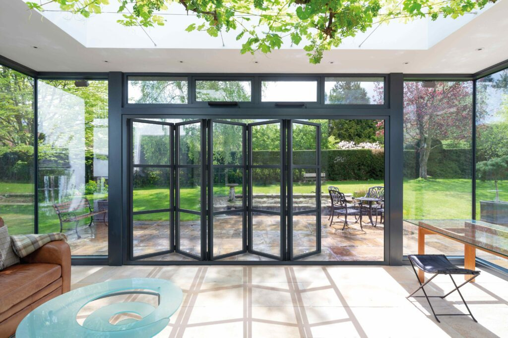 image-2-2 | GFD Homes GFD Homes Crittall-style bifolds installed in a home's living room.