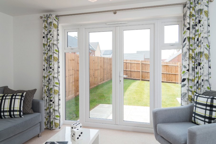 Screenshot-2023-08-24-at-10.51.18 | GFD Homes Double glazed doors used as patio doors with a garden in view.