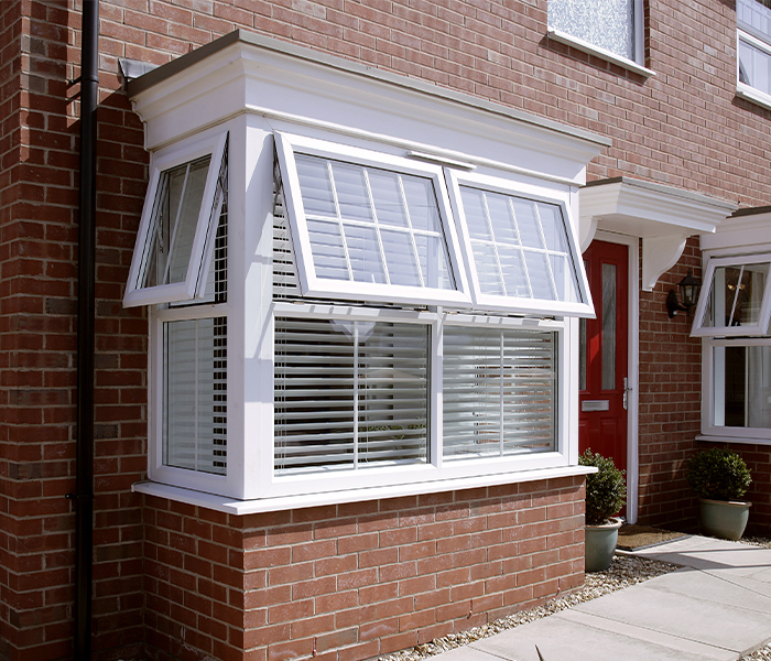 GFD Homes bay window installation: home with eurocell bay window installed