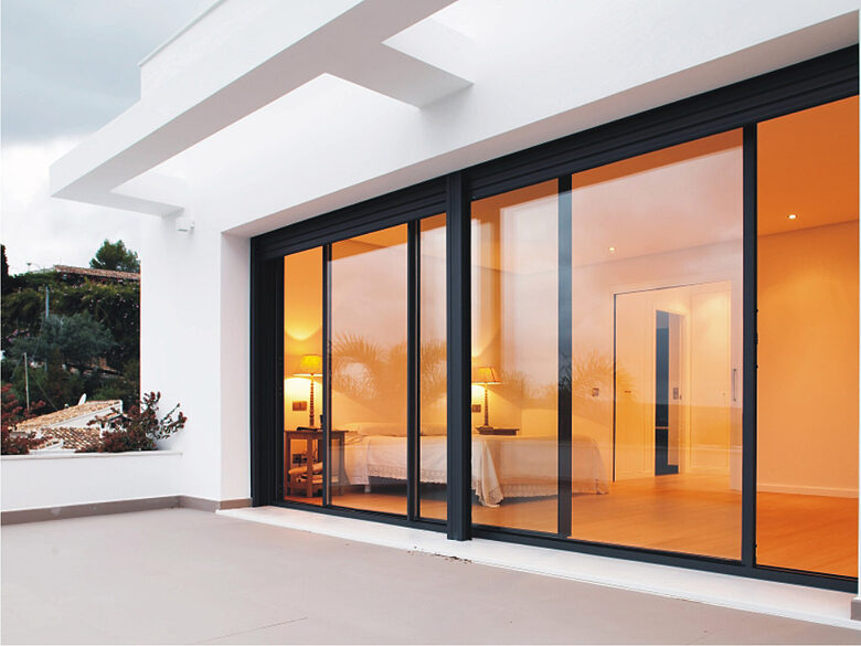 Smart Aluminium bifold and sliding doors creating a light-filled open-plan living space with sleek, modern frames.