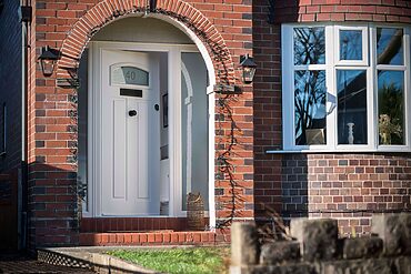 A stylish Solidor composite door with modern detailing and premium hardware.