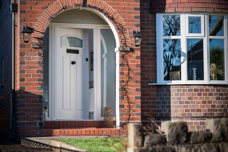 A stylish Solidor composite door with modern detailing and premium hardware.