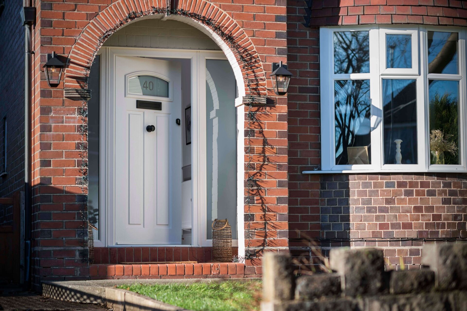 GFD Homes A stylish Solidor composite door with modern detailing and premium hardware.