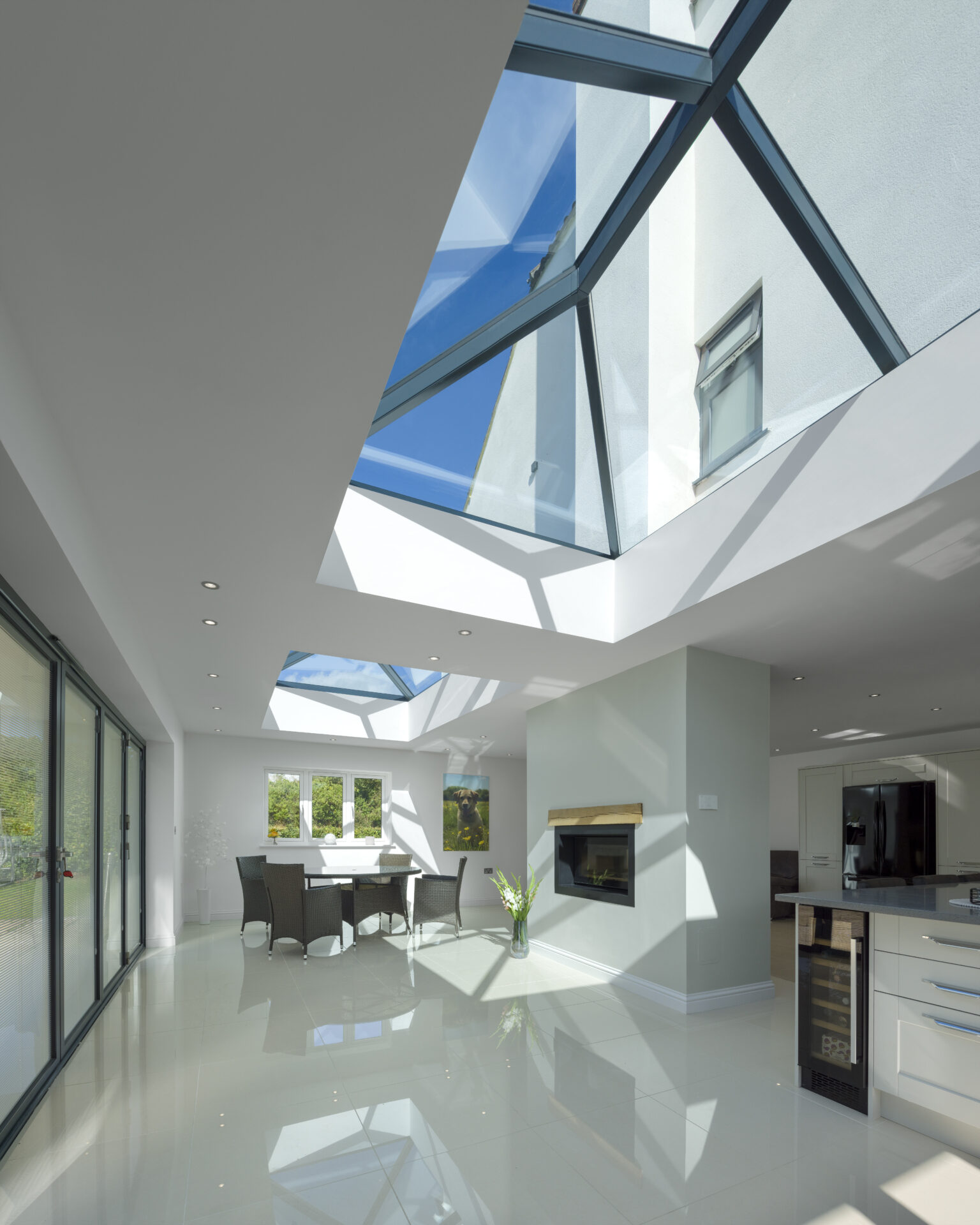 GFD Homes An Atlas aluminium roof lantern from GFD Homes adding natural light and modern elegance to a stylish open-plan kitchen.