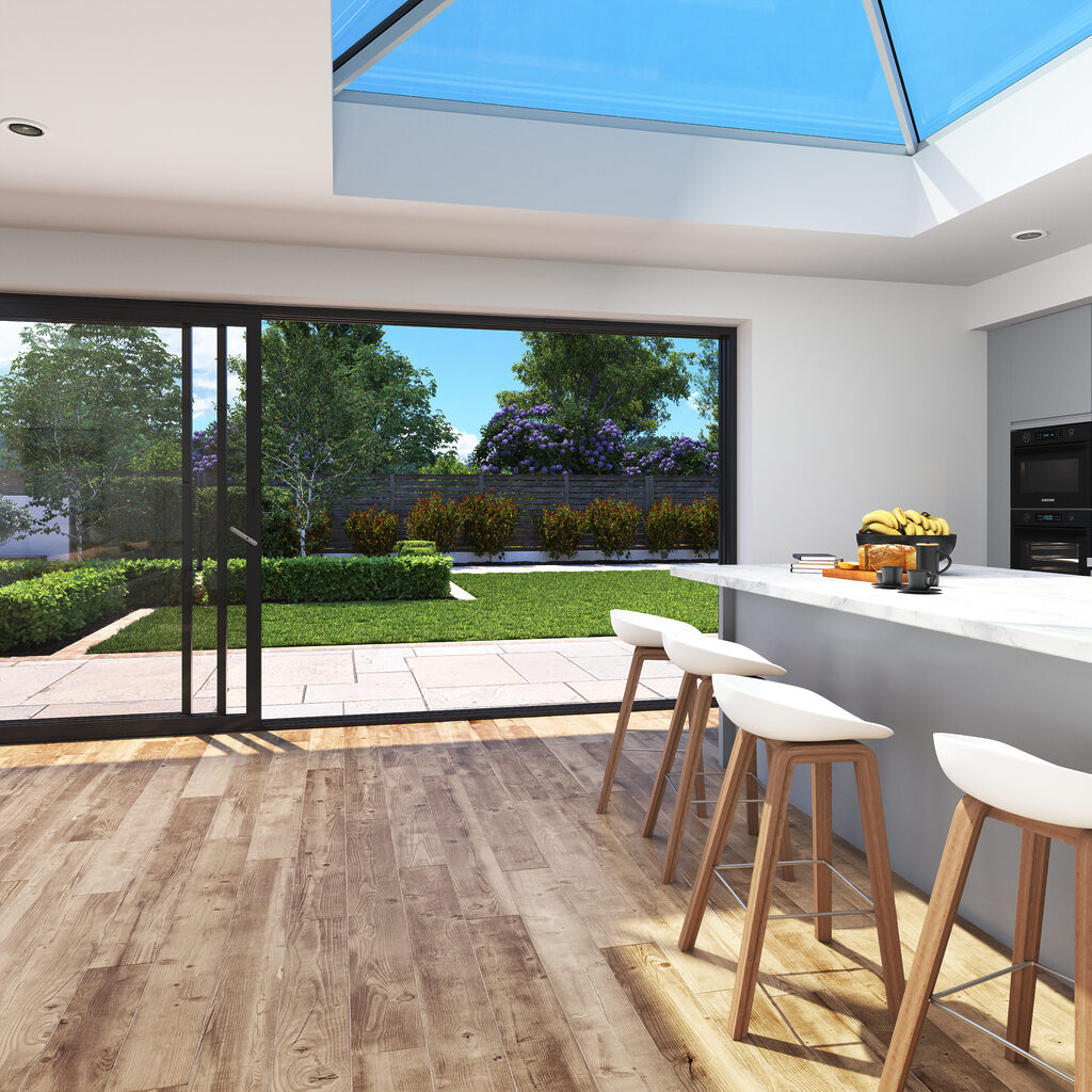 3PANE_SLIDER_INTERIOR_F280 | GFD Homes Korniche: sliding door wide open with kitchen island in view