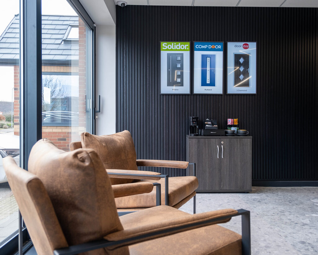 _DSF3283 | GFD Homes upvc windows near me: GFD showroom with chairs and coffee area in view