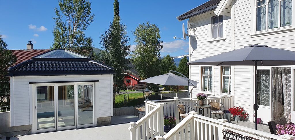 NORWAY CLIENT 2 | GFD Homes double doors: garden with patio sliding doors and an outbuilding with bifold doors