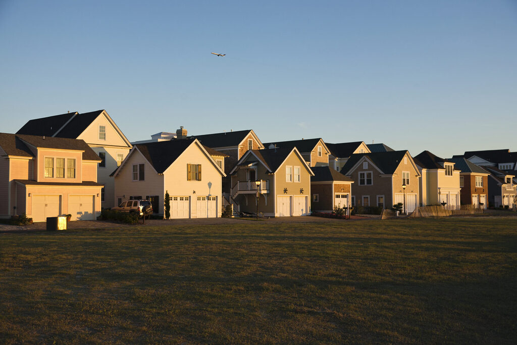 energy ratings explained: a plot of homes with the sun setting 