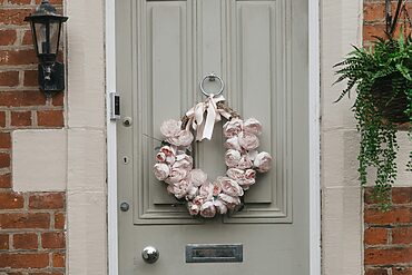 Choosing a seasonal wreath that complements your composite door colour can instantly transform your home’s entrance as the blooms change from spring to summer