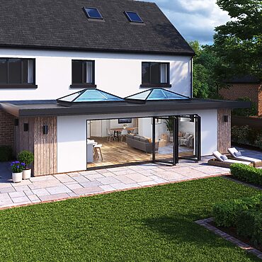 Korniche aluminium bifold doors and roof lanterns transforming a bright, open living space