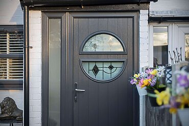 Shield your home from seasonal warping and UV fading with a high-performance Comp Door featuring built-in solar-deflective skin technology.