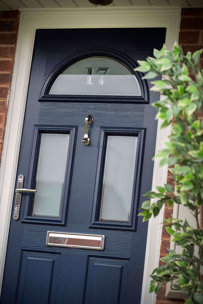 Modernize your home's exterior with a premium Comp Door from GFD Homes, upgrading to a smooth SleekSkin finish for a refined, hand-painted aesthetic.