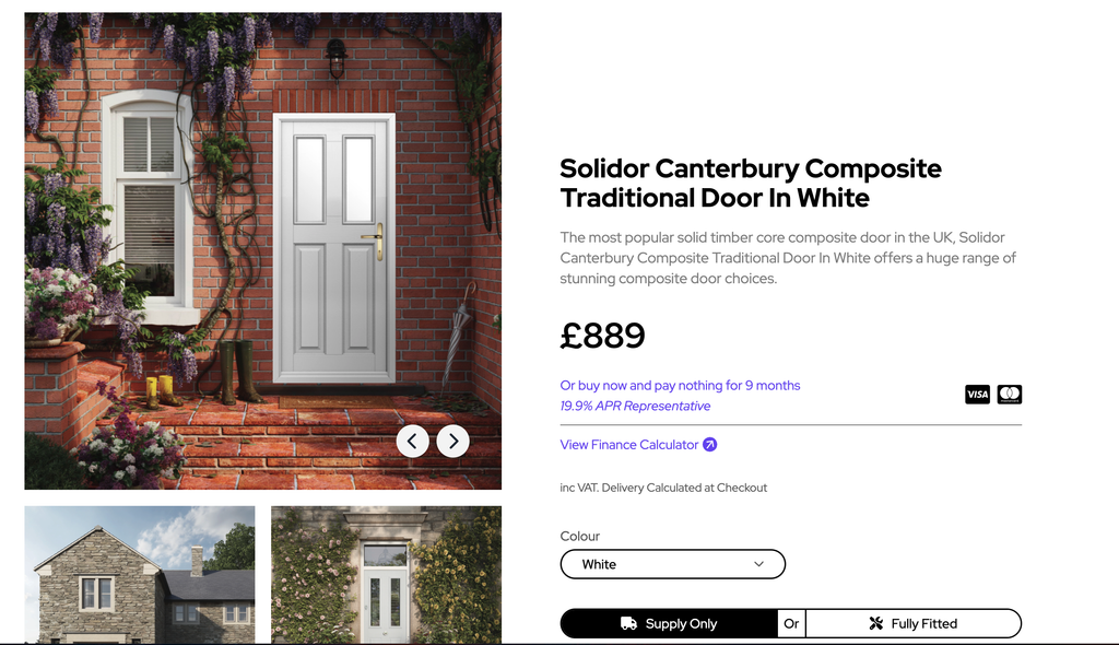 GFD Homes White traditional composite door in a red brick porch, with purple flowering vines and greenery around the doorway