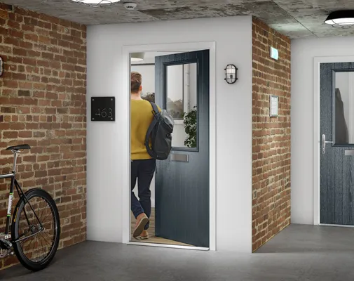 Man walking into home