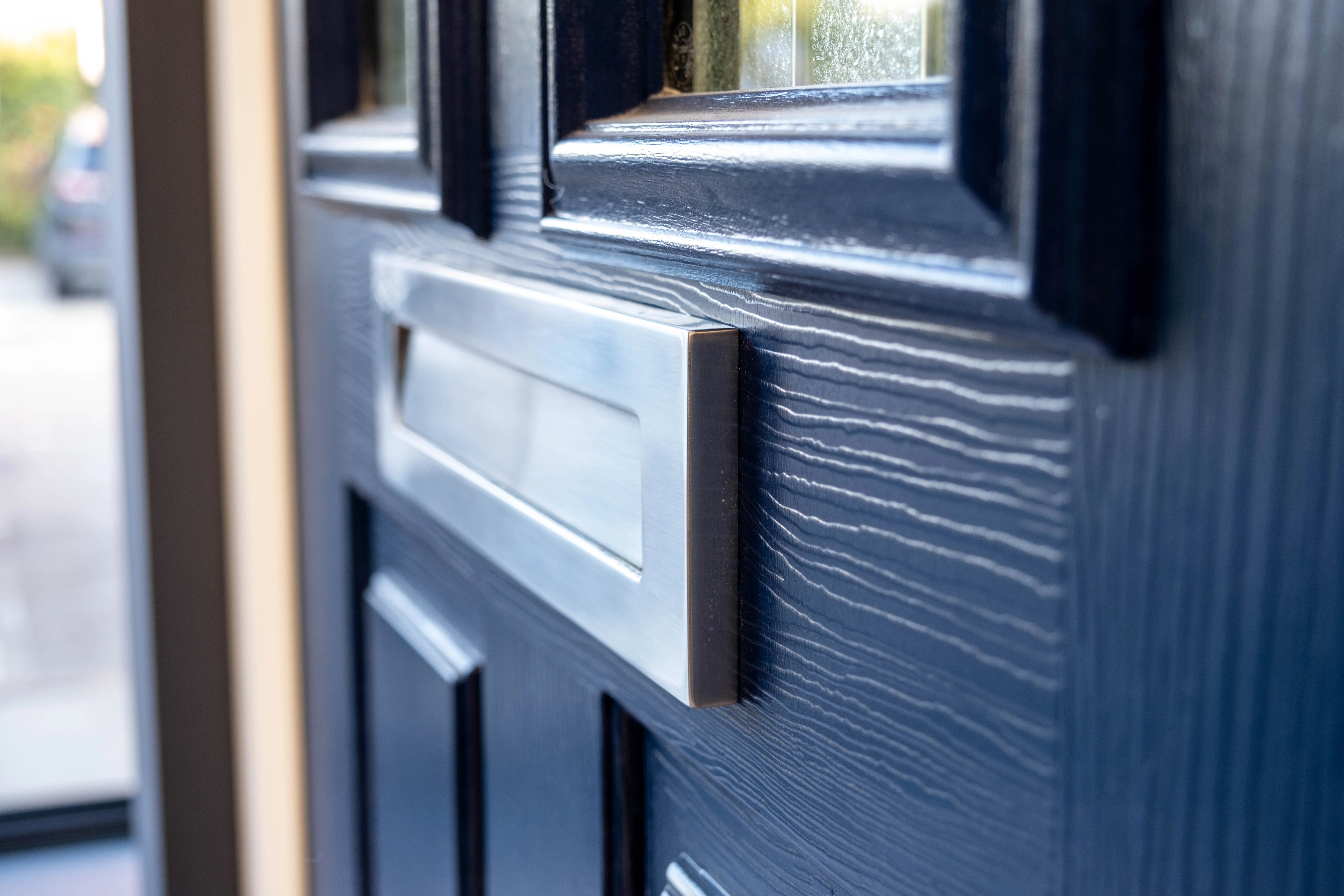 black door with letterbox 