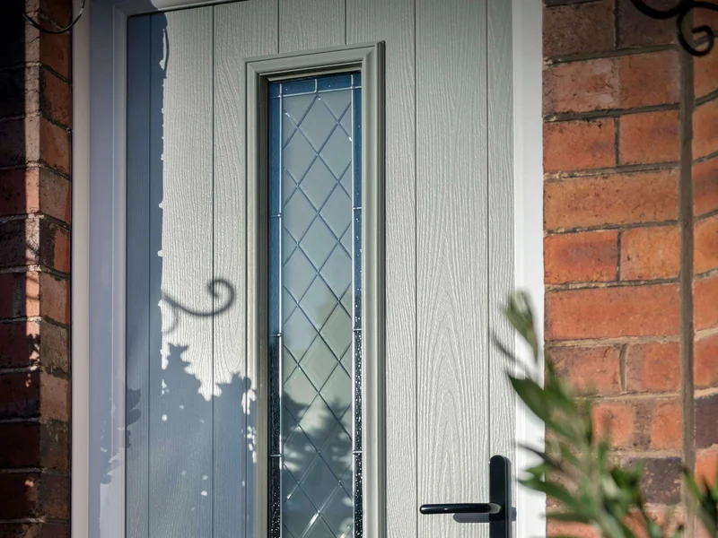 Composite door frame weather sealing